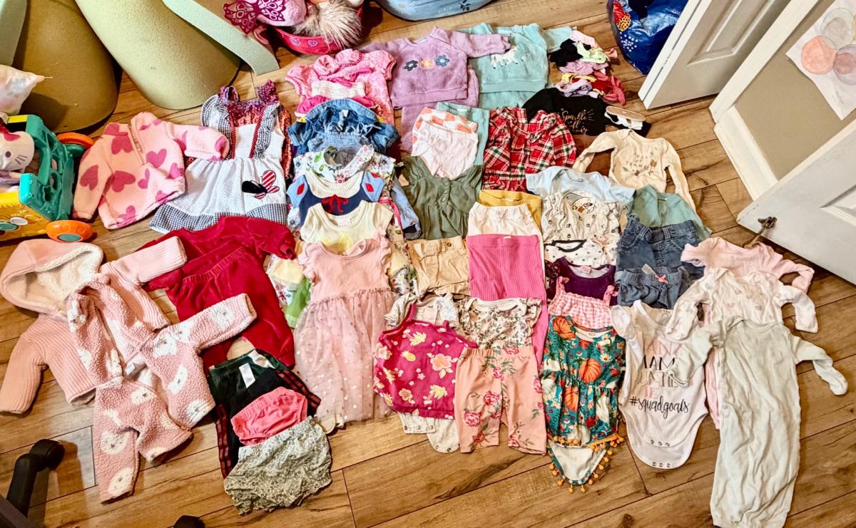 assorted baby girl clothes