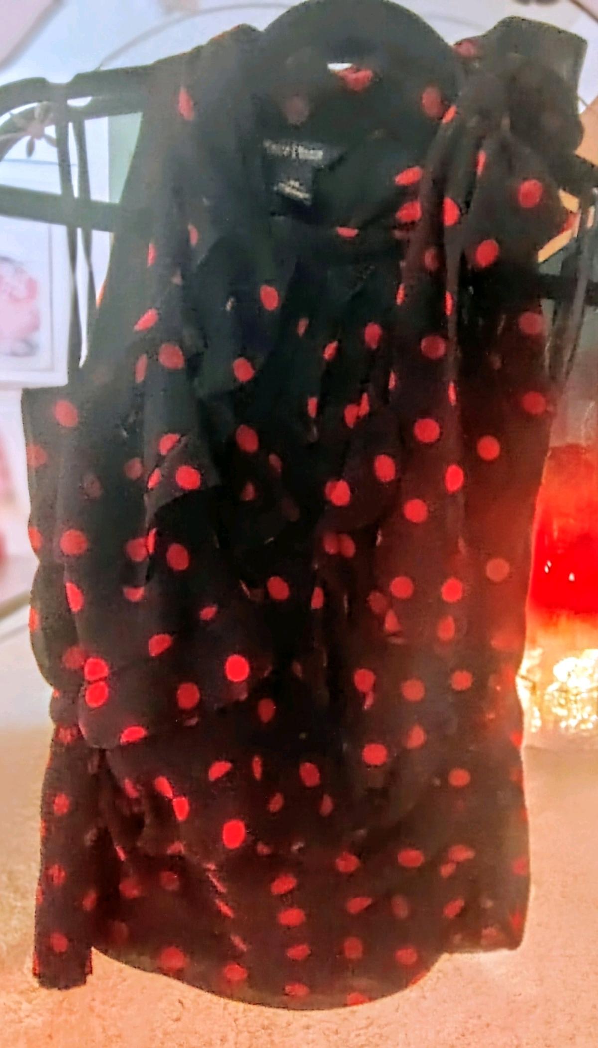 Black blouse with red pocka dots