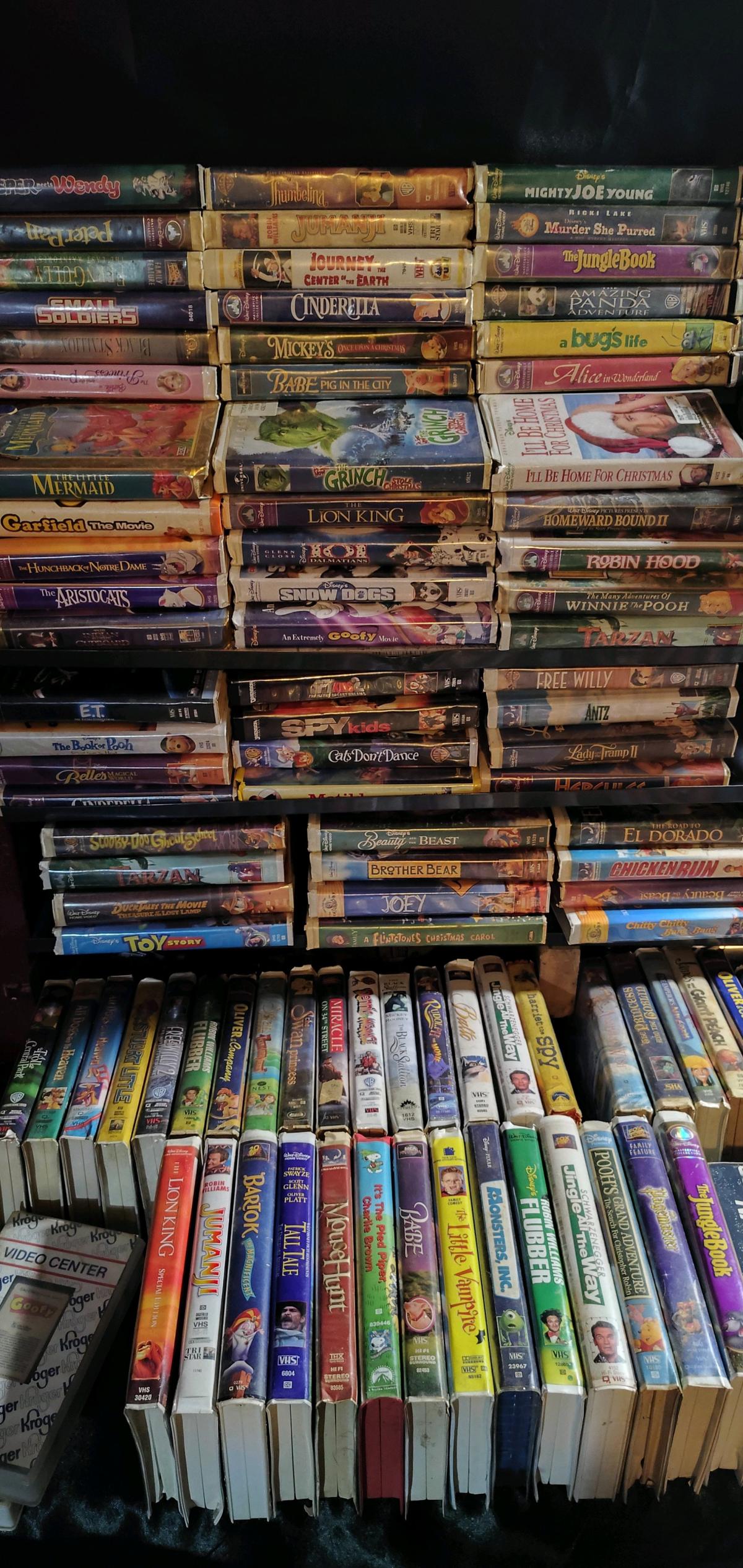 lot of DVDs and VHS types Android shape