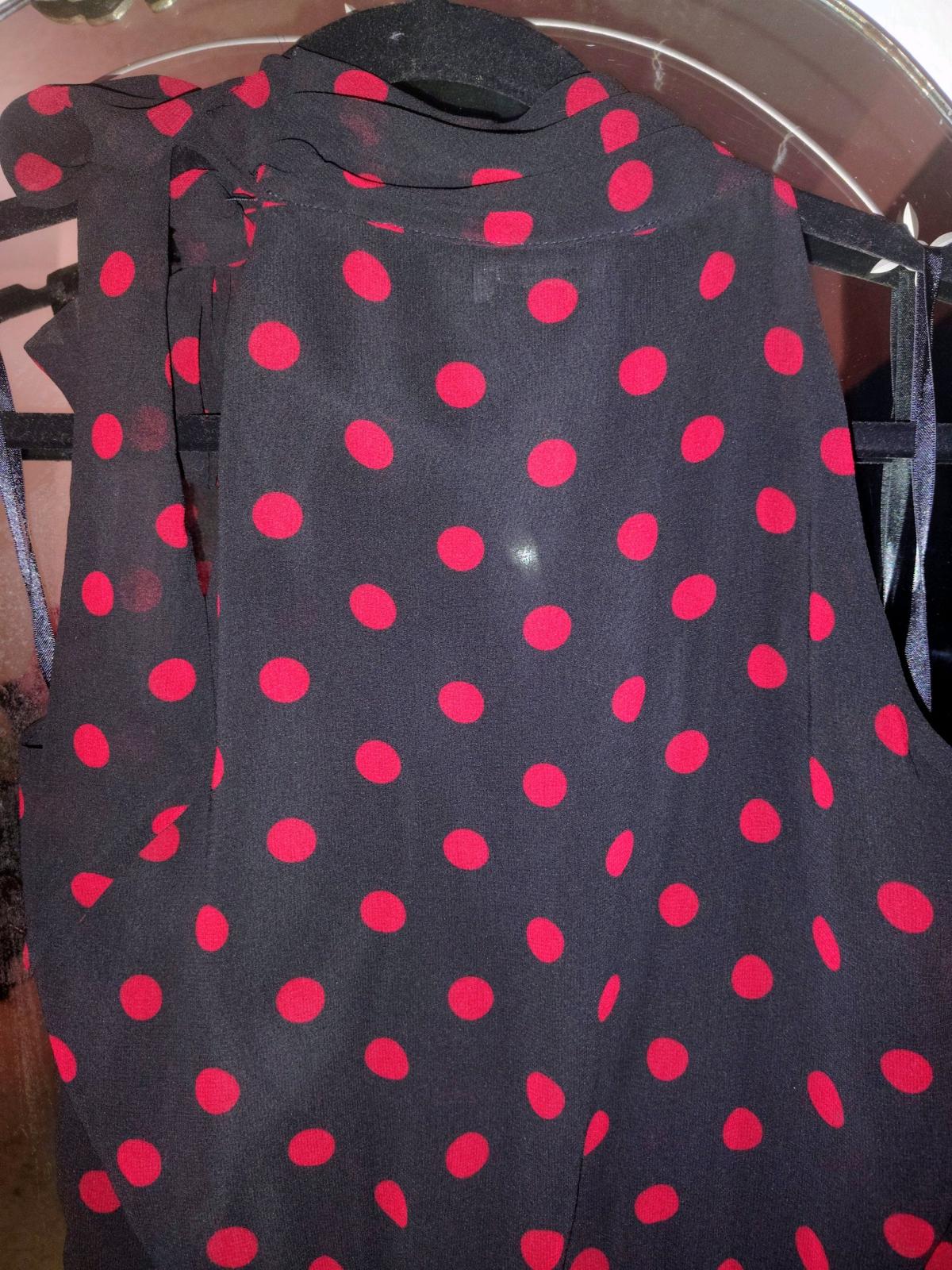 Black blouse with red pocka dots