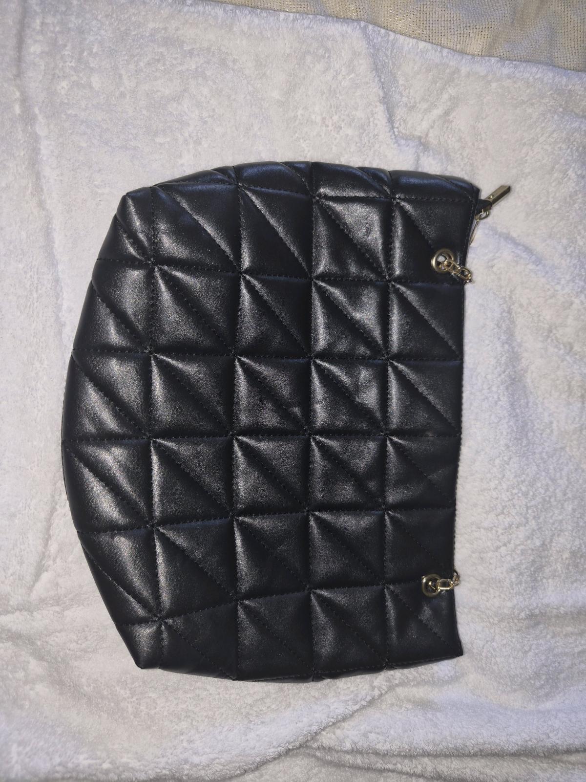 Black shoulder or crossbody meduim hang bag