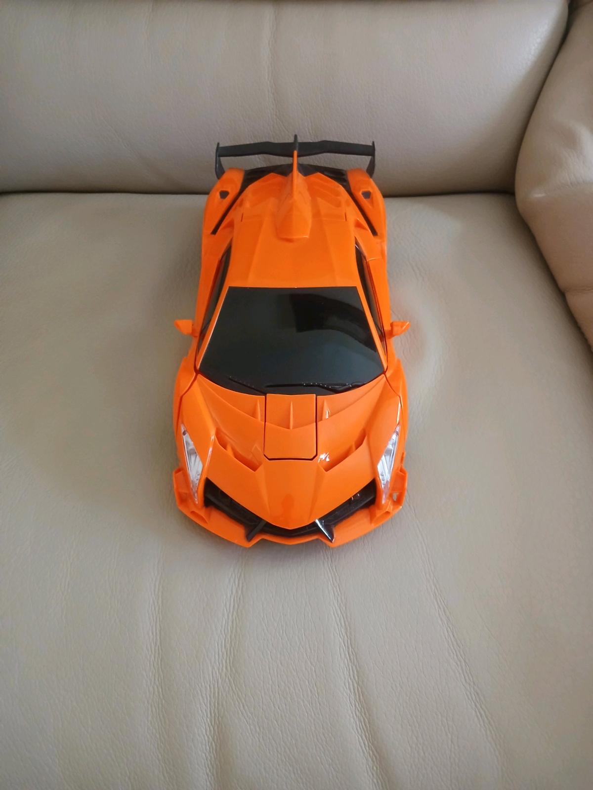 Toy car bundle orange car can turn into a robot