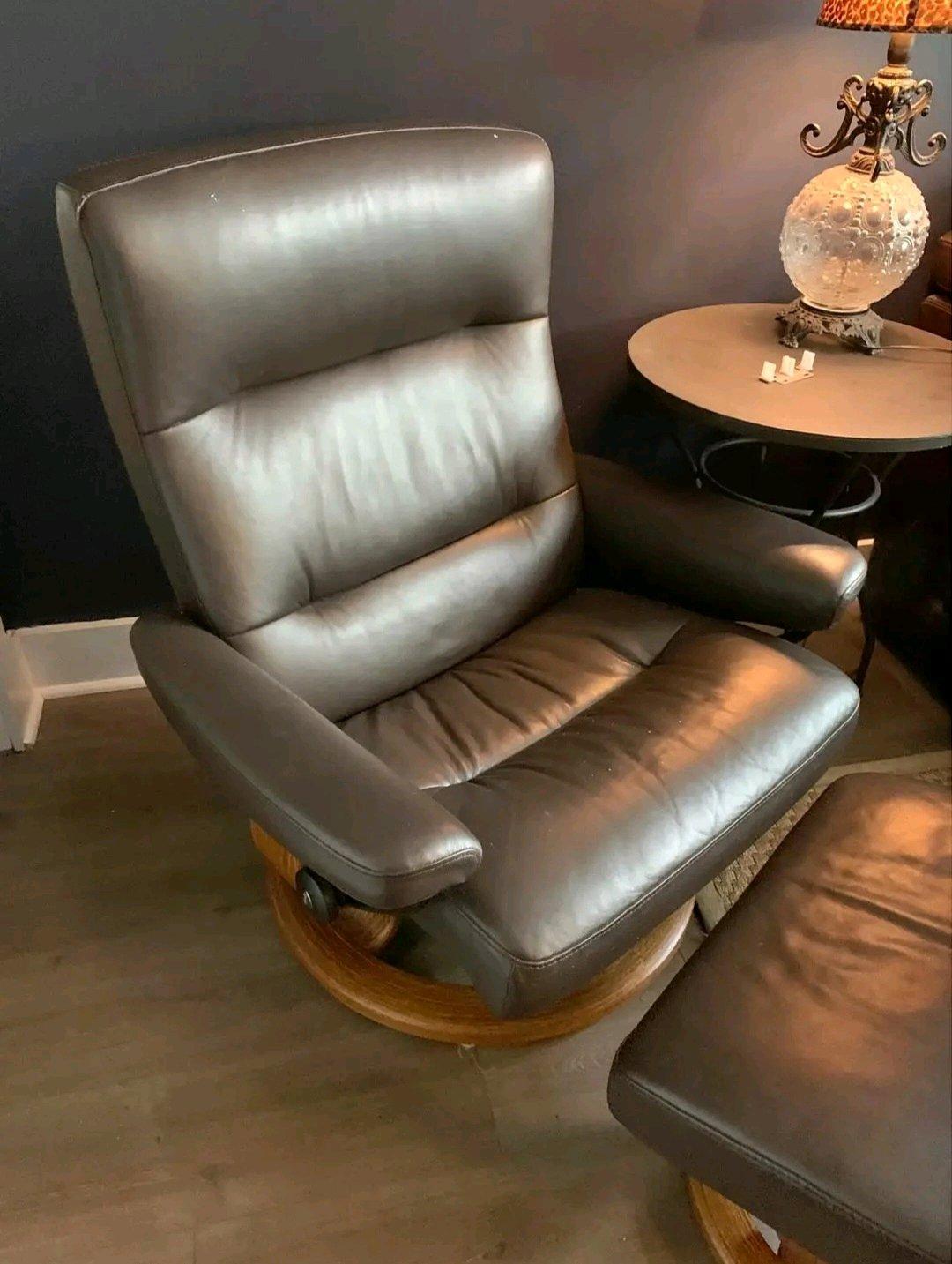 Ekornes brown leather recliner and ottoman