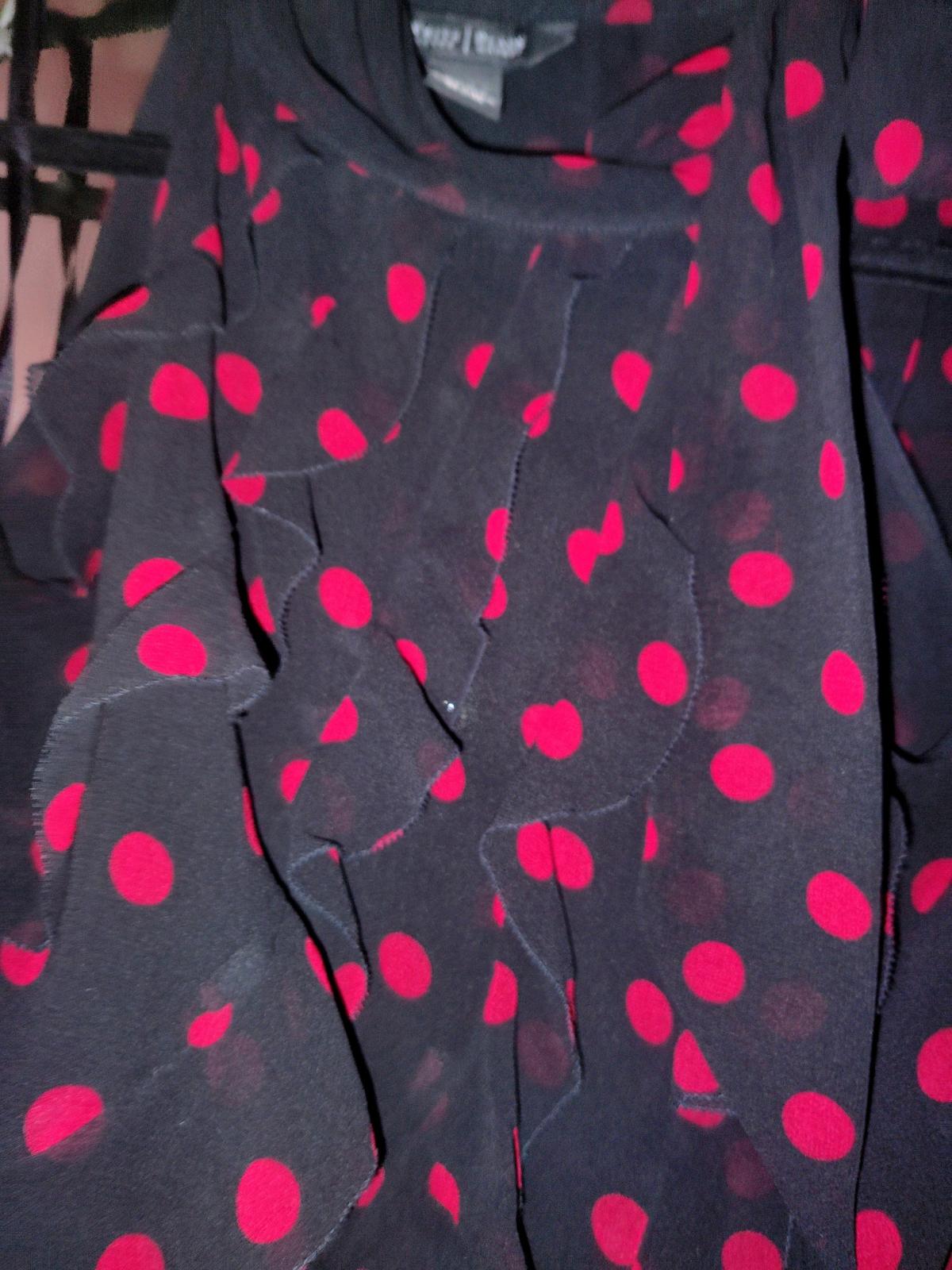 Black blouse with red pocka dots