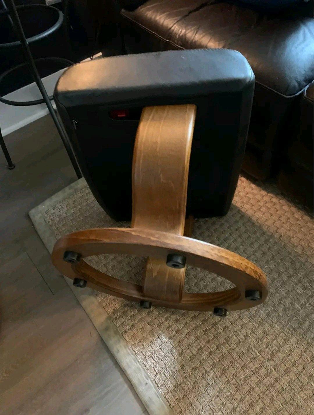 Ekornes brown leather recliner and ottoman