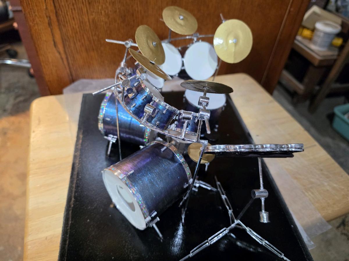Miniature handmade model drum set