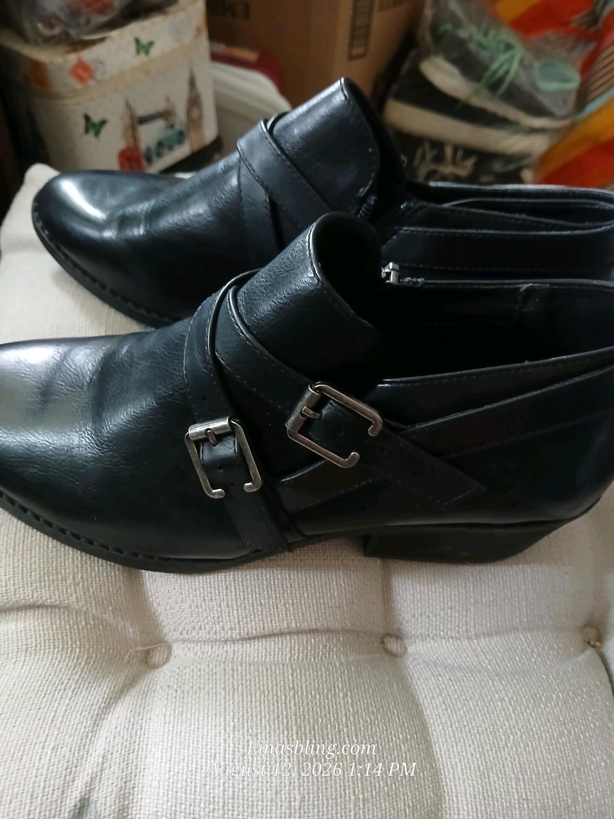 Black buckle ankle boots