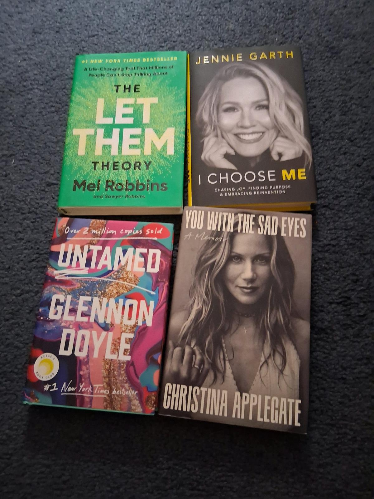 Four Hardcover books and four soft