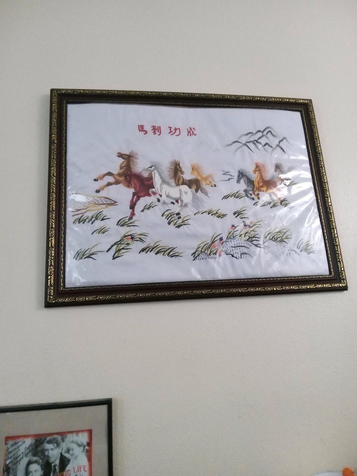 very old embroidered paintings still wrapped in plastic