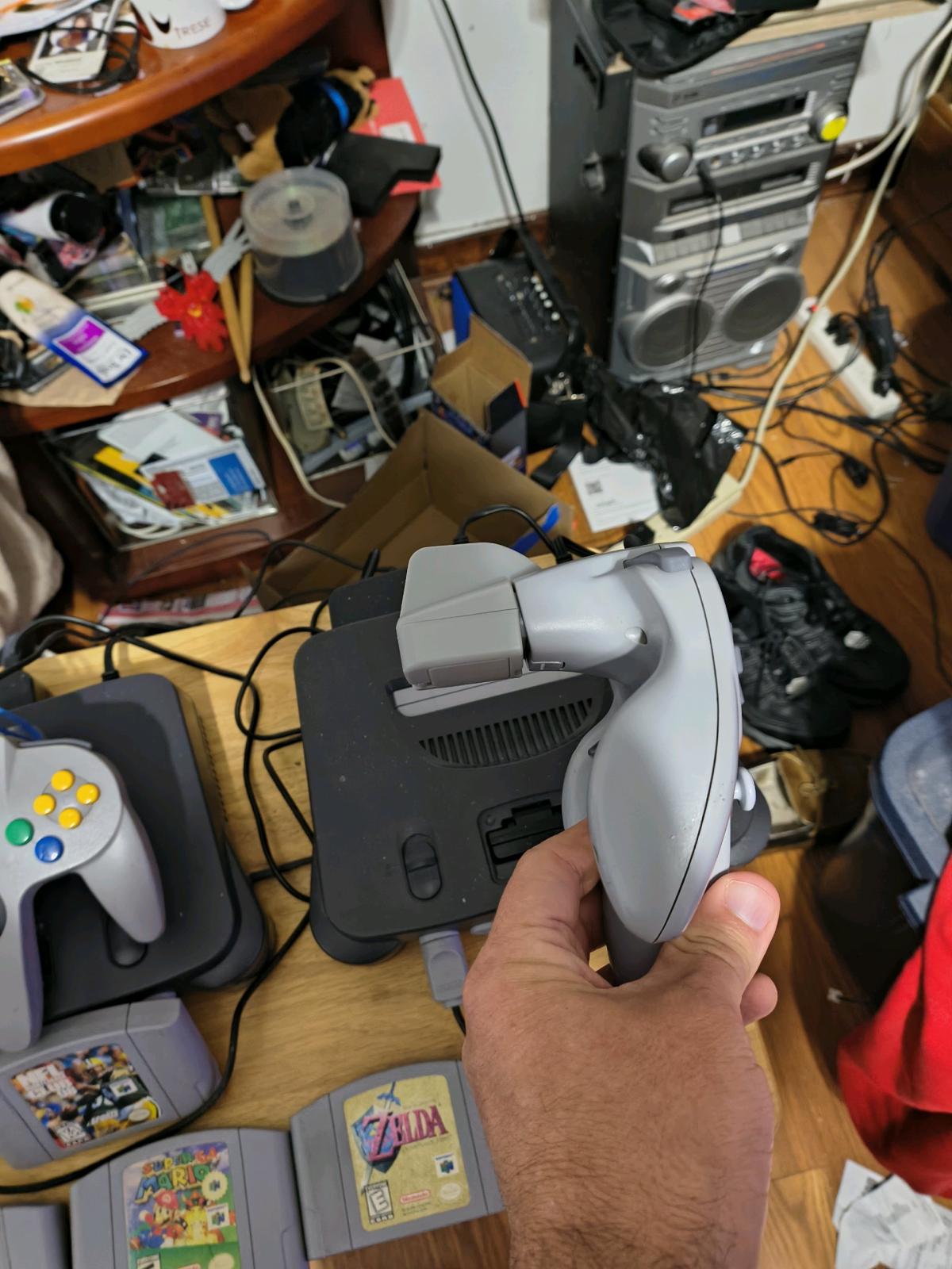 2 Nintendo 64 consoles with games
