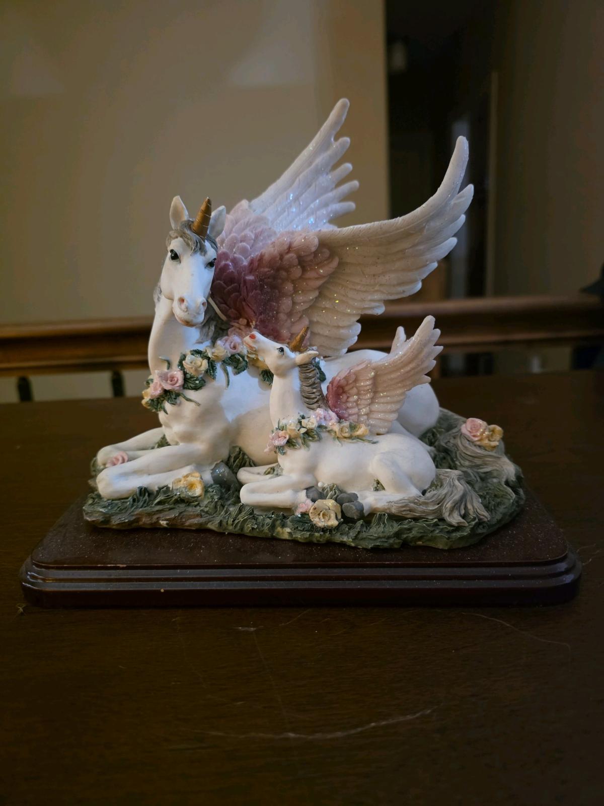 2 UNICORN Figurines   50 Each