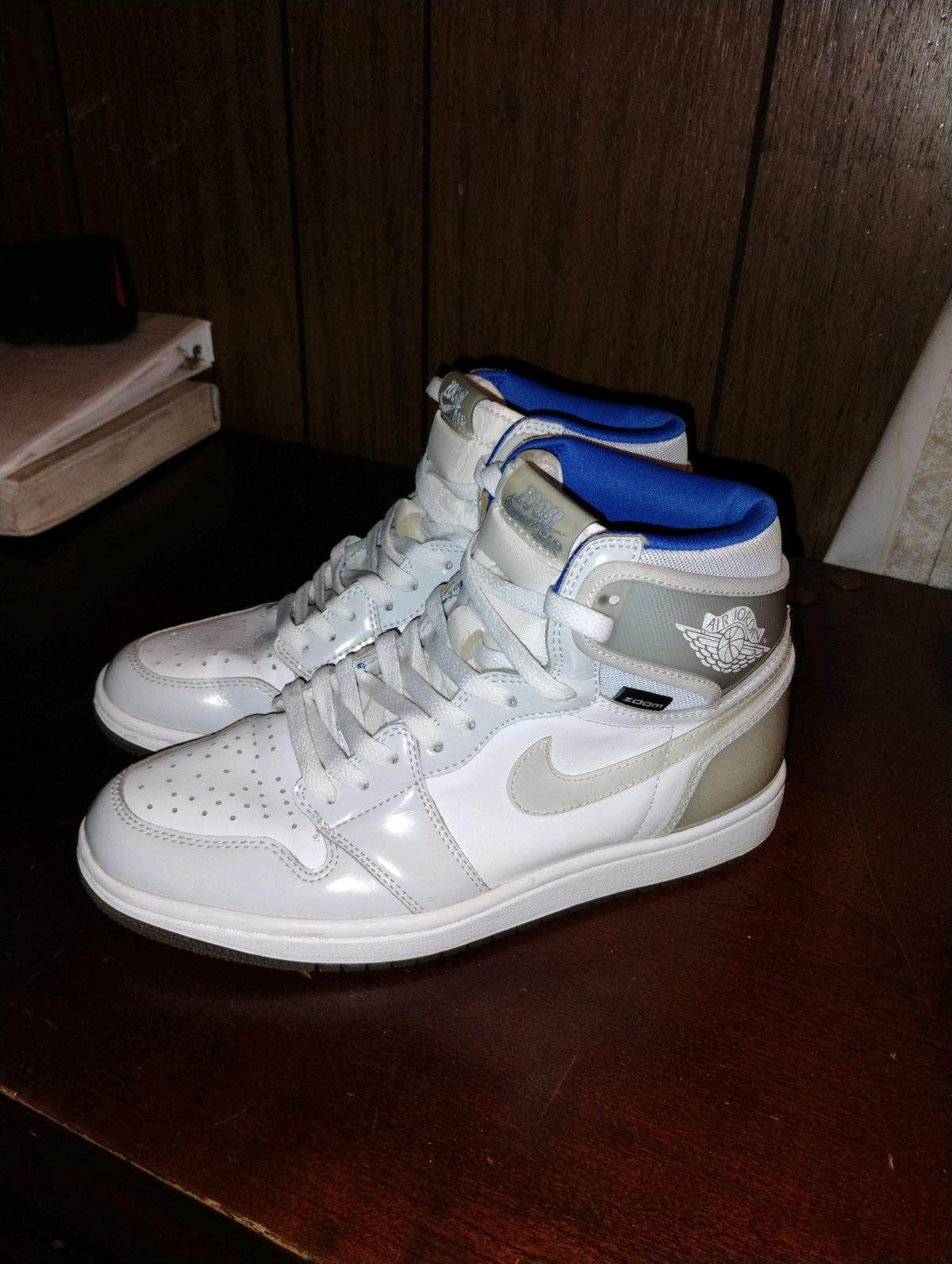Grey and white and blue Air Jordans Zooms
