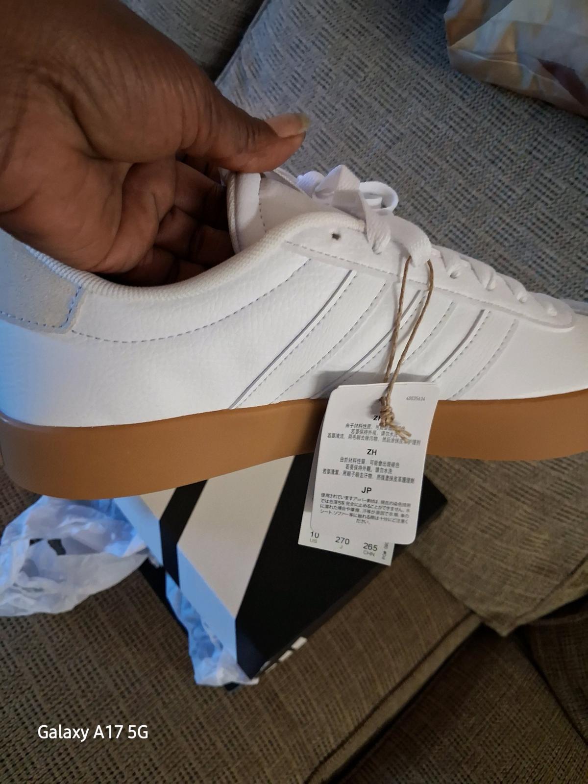 Adidas tennis shoes size 10 half  men