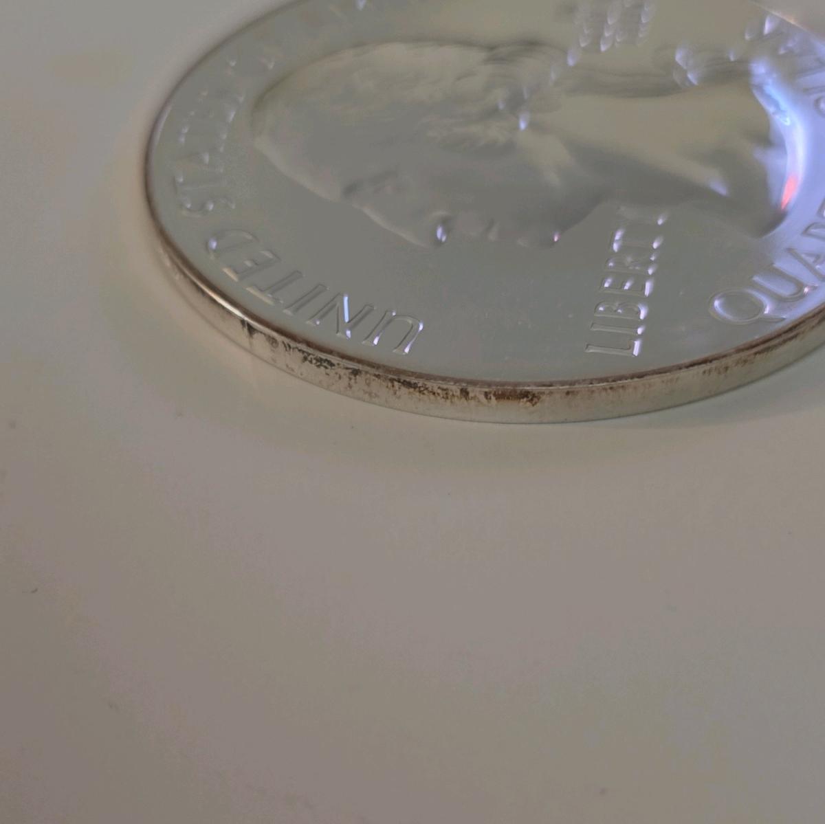 5oz silver minted as quarter dollar