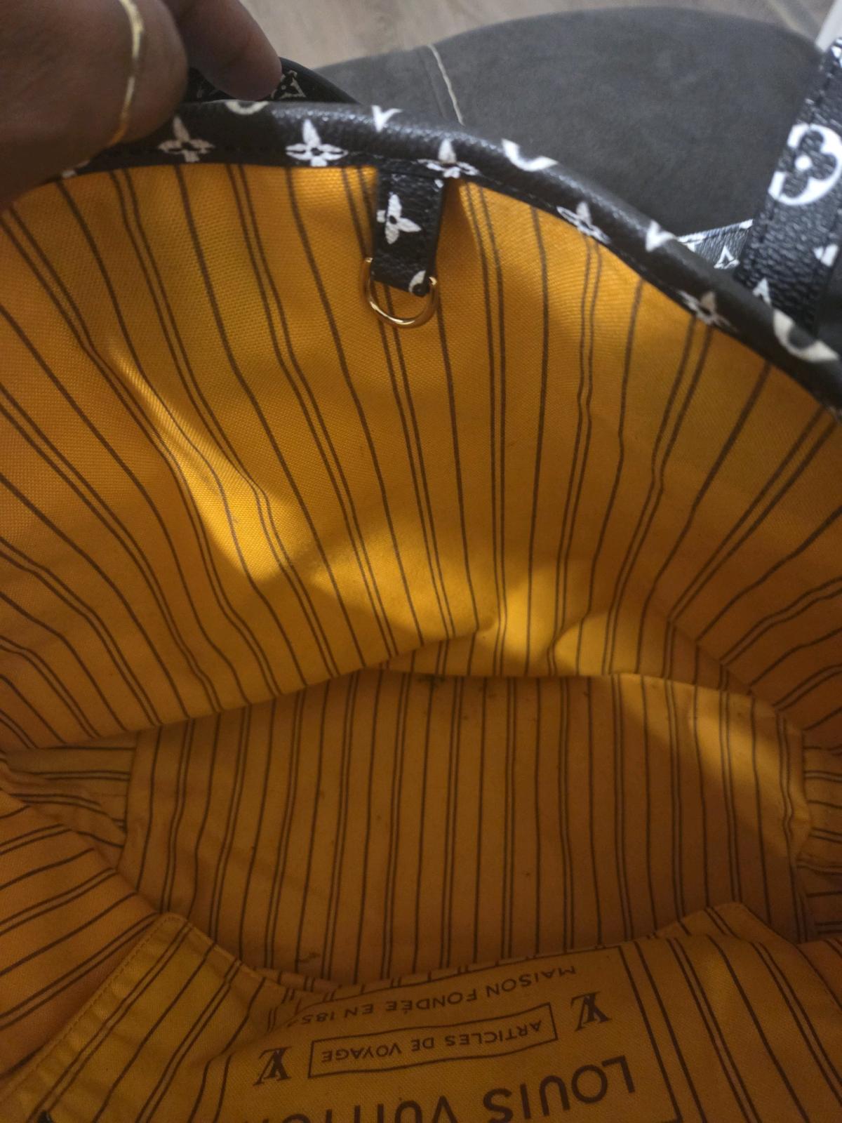 Large tote bag with letters L and V