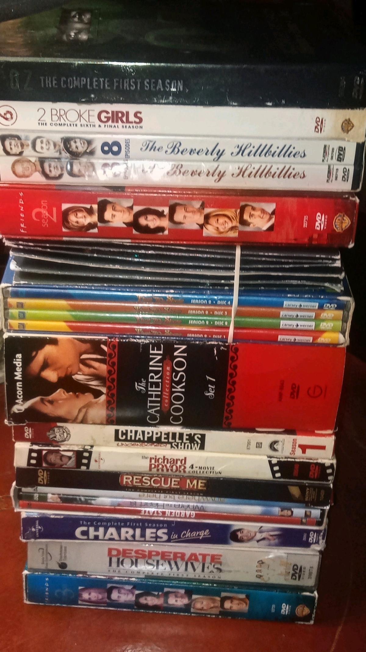 over 100 dvd movies all in case like new