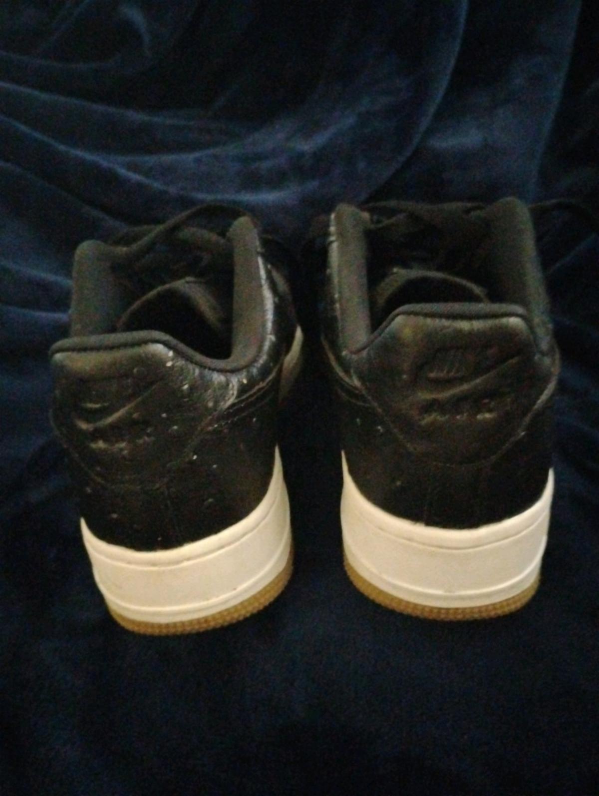 Black Nike Air Force 1 lowtop ostrichtextured leather