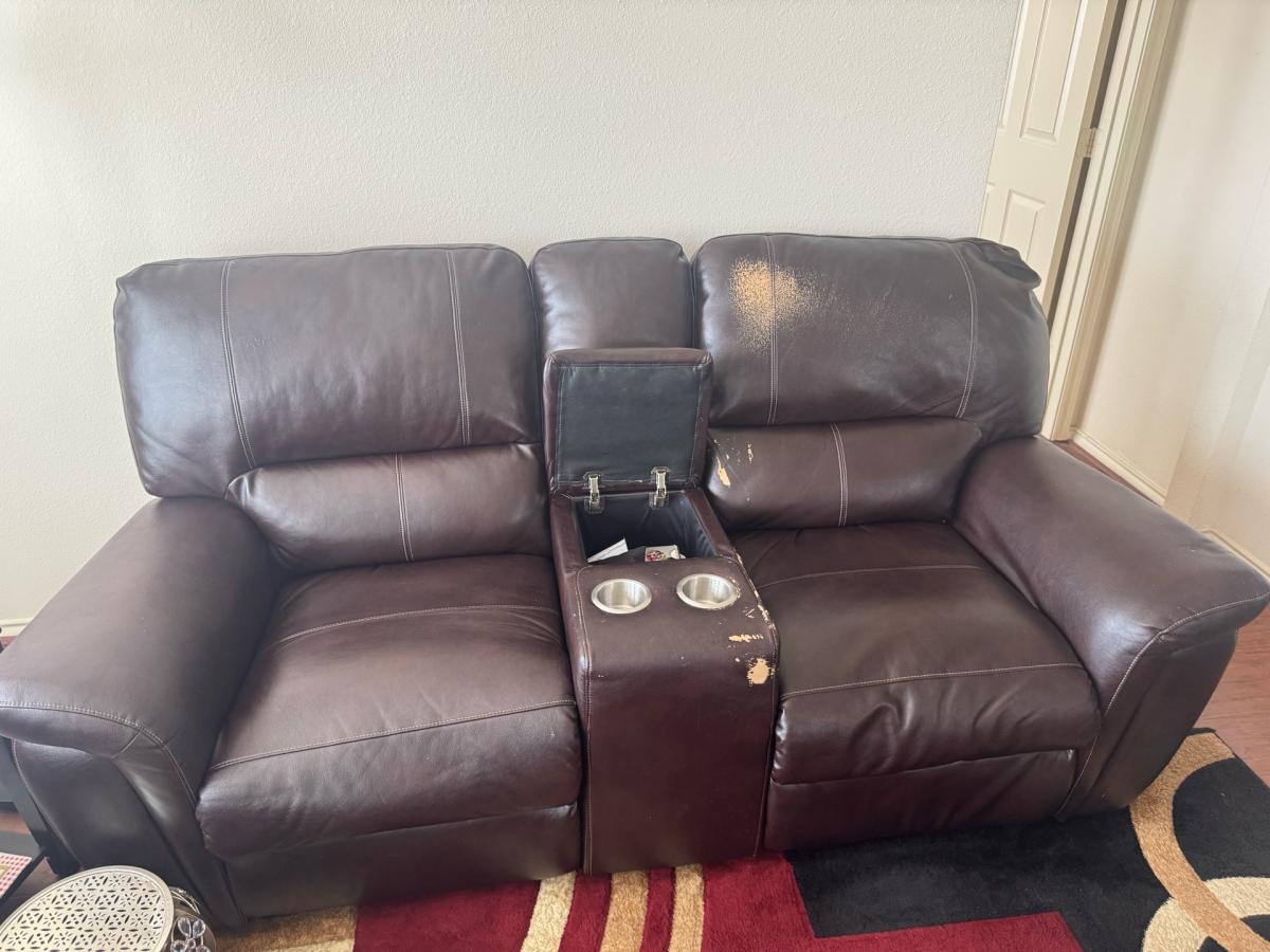 Brown Leather Reclining Loveseat with storage and cup holder