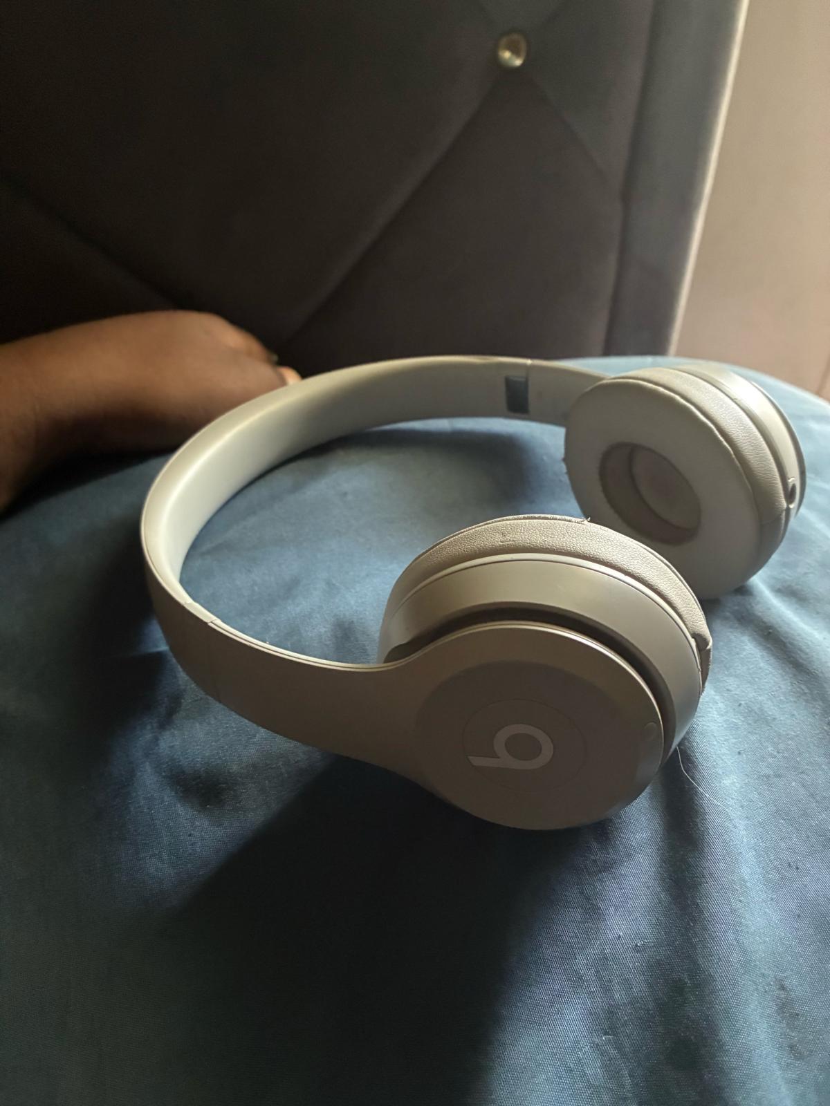 Beats Solo 4 headphones gray and white