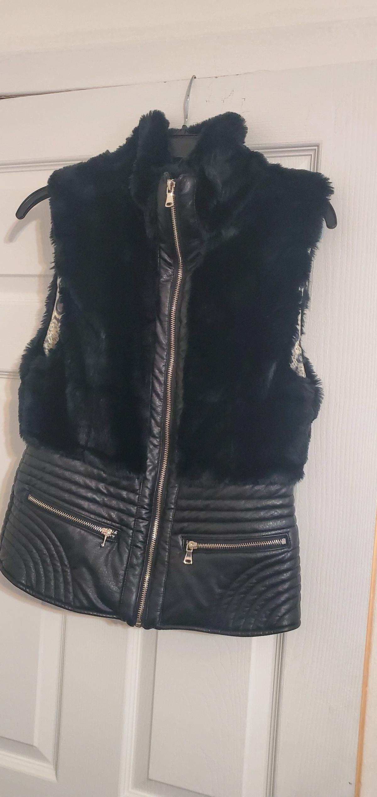 leather accent jacket by the brand Fate