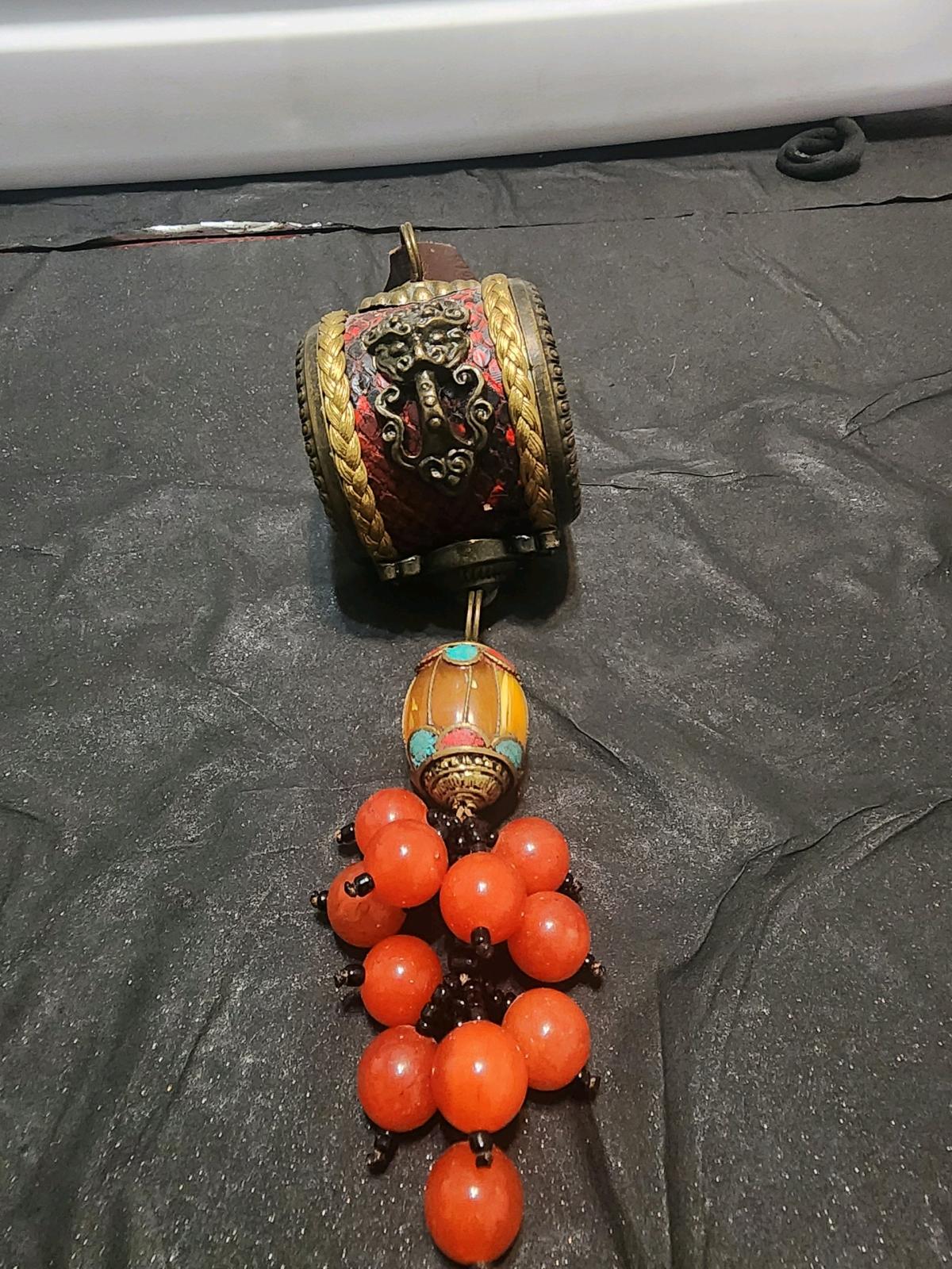 An ornate ethnic orHimalayanstyle barrel pendantfocal bead r
