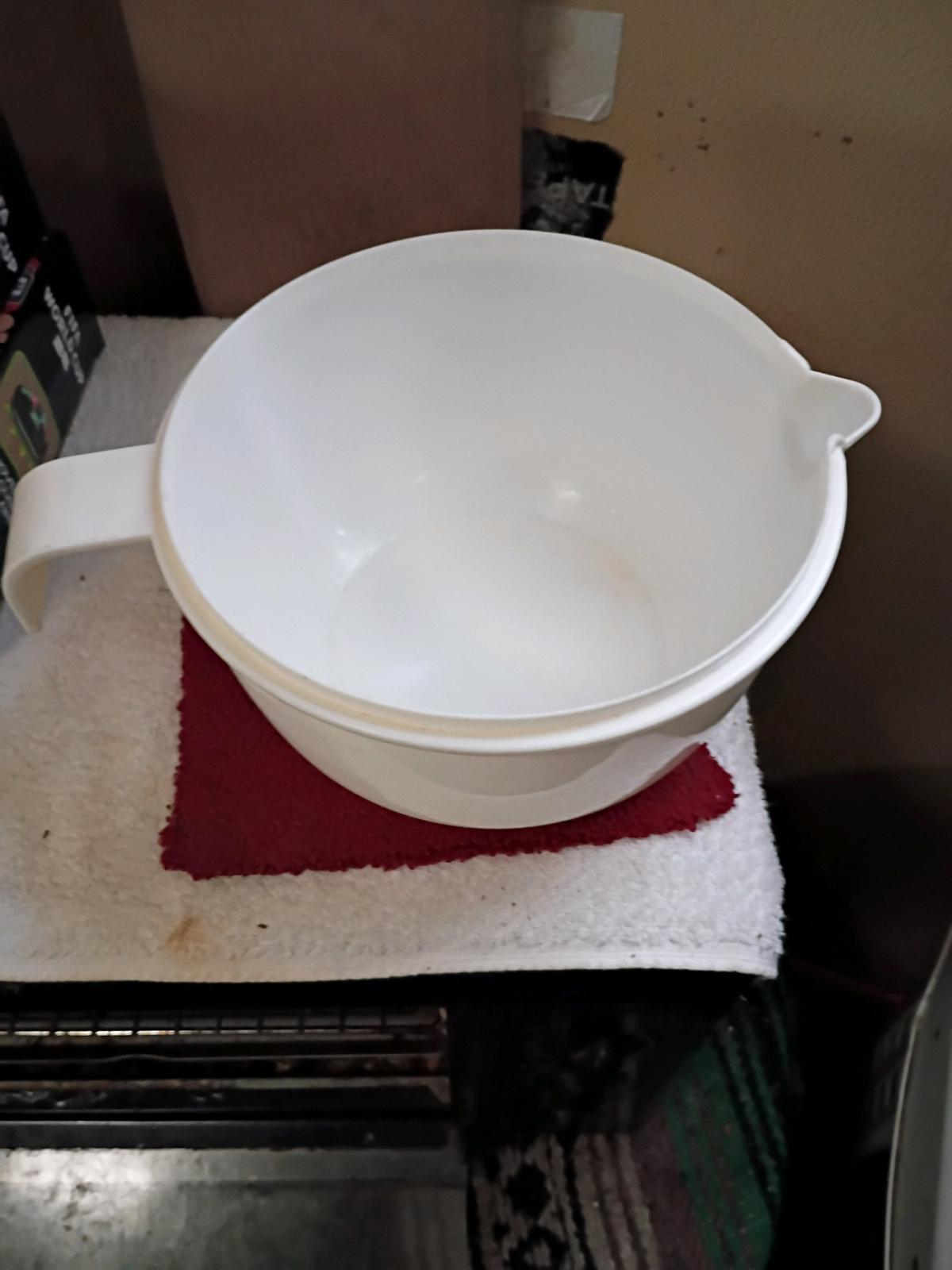 A White Large Mixing Bowl with Handle
