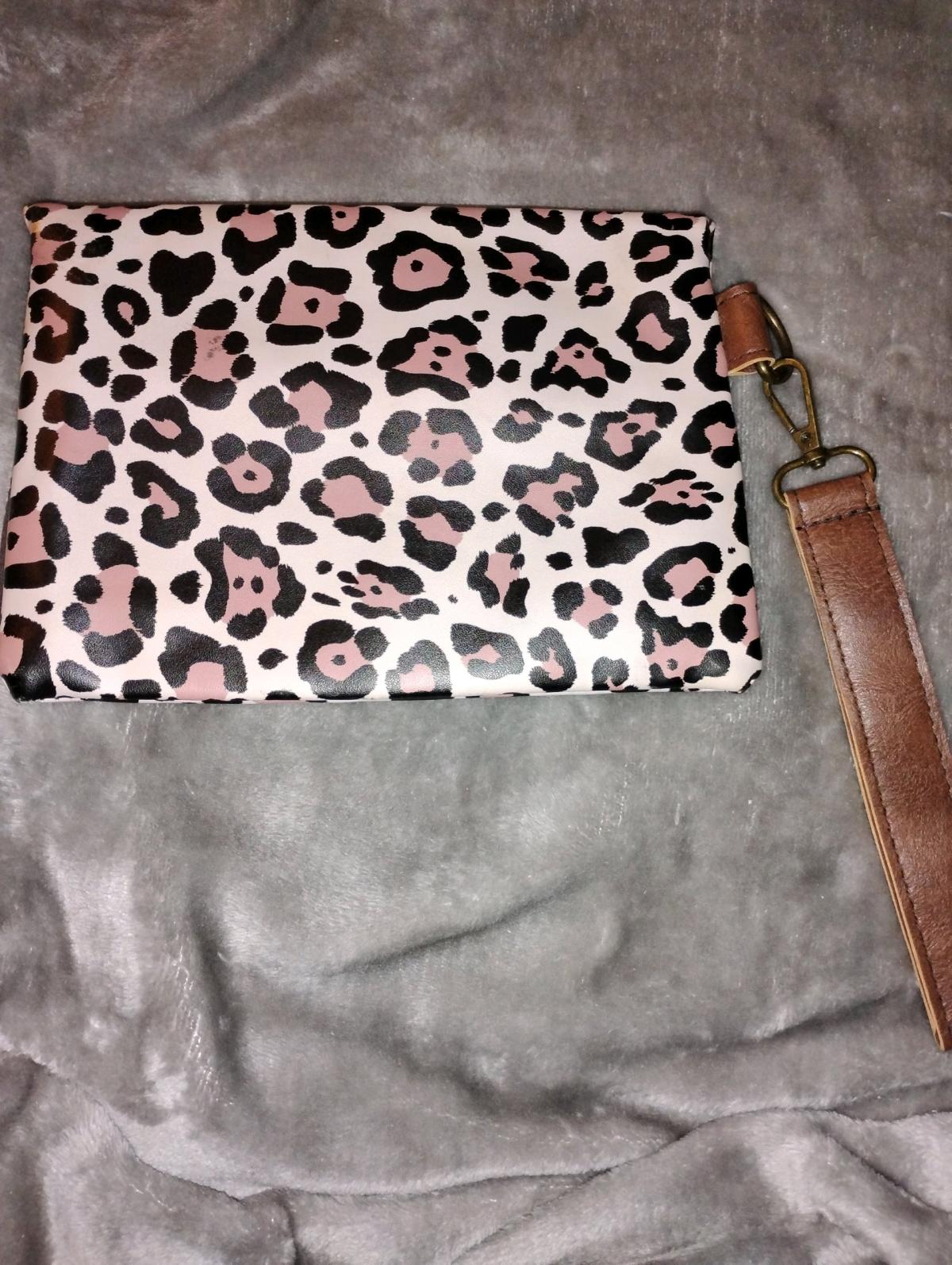 Louis Vuitton leopard print wristlet clutch