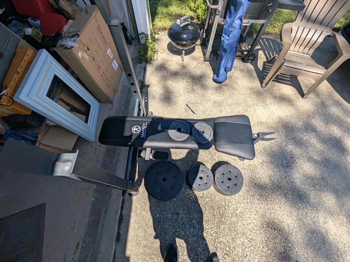 marcy weight bench with 100 lbs of weights