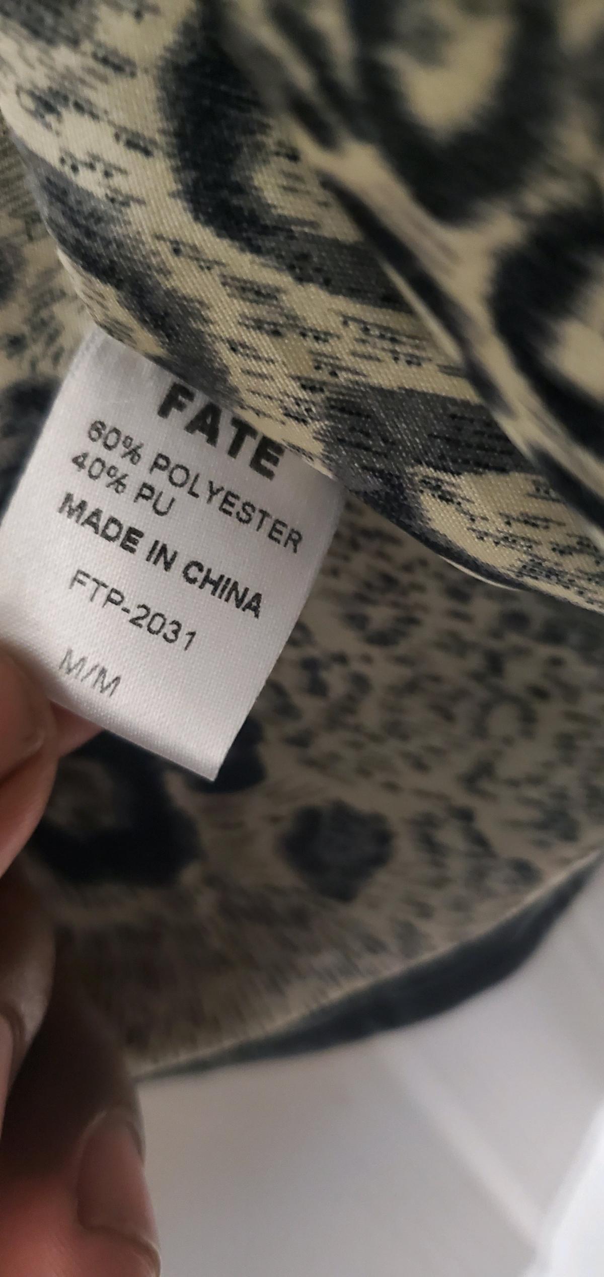 leather accent jacket by the brand Fate