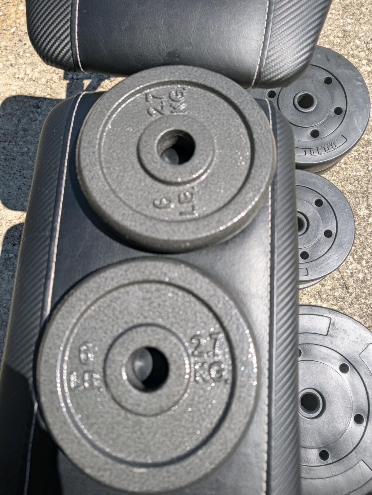 marcy weight bench with 100 lbs of weights