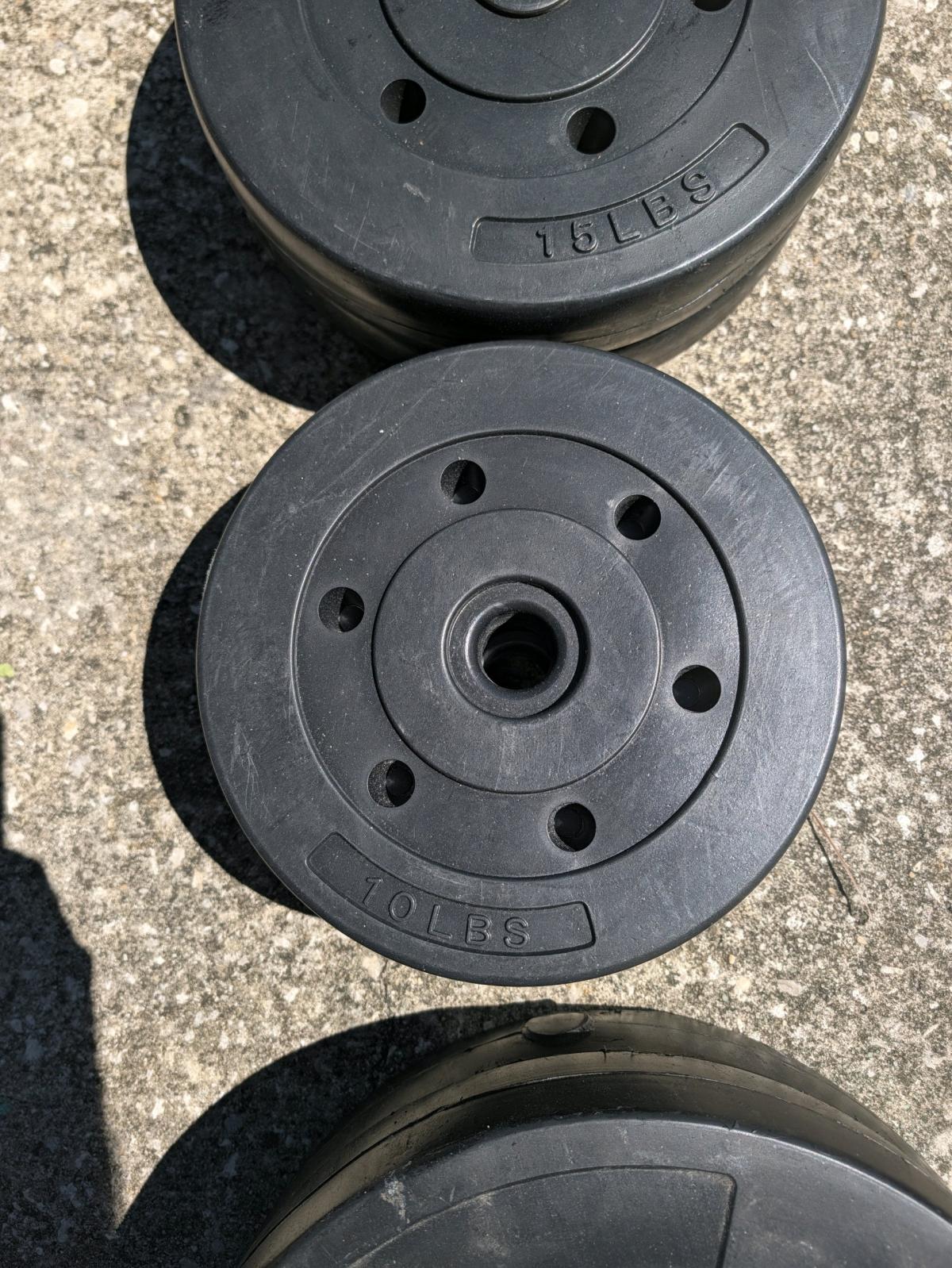 marcy weight bench with 100 lbs of weights