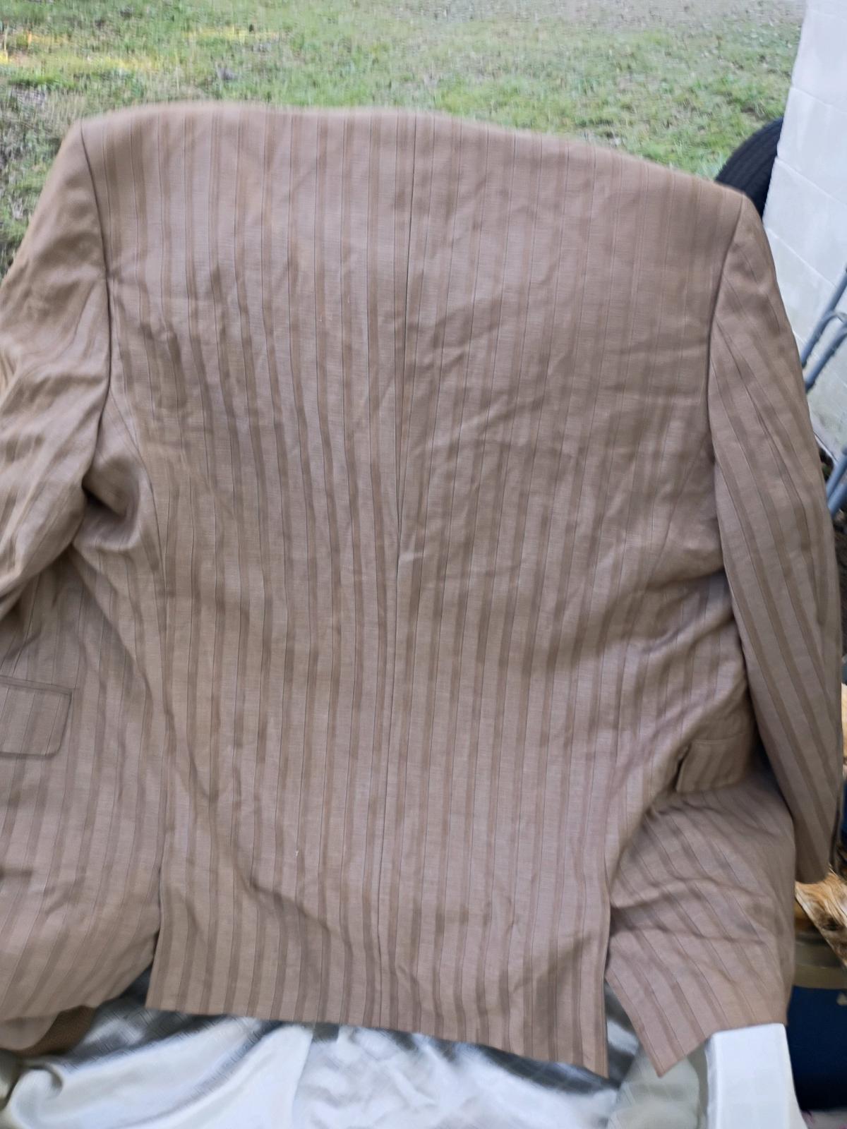 A mens brown blazer jacket