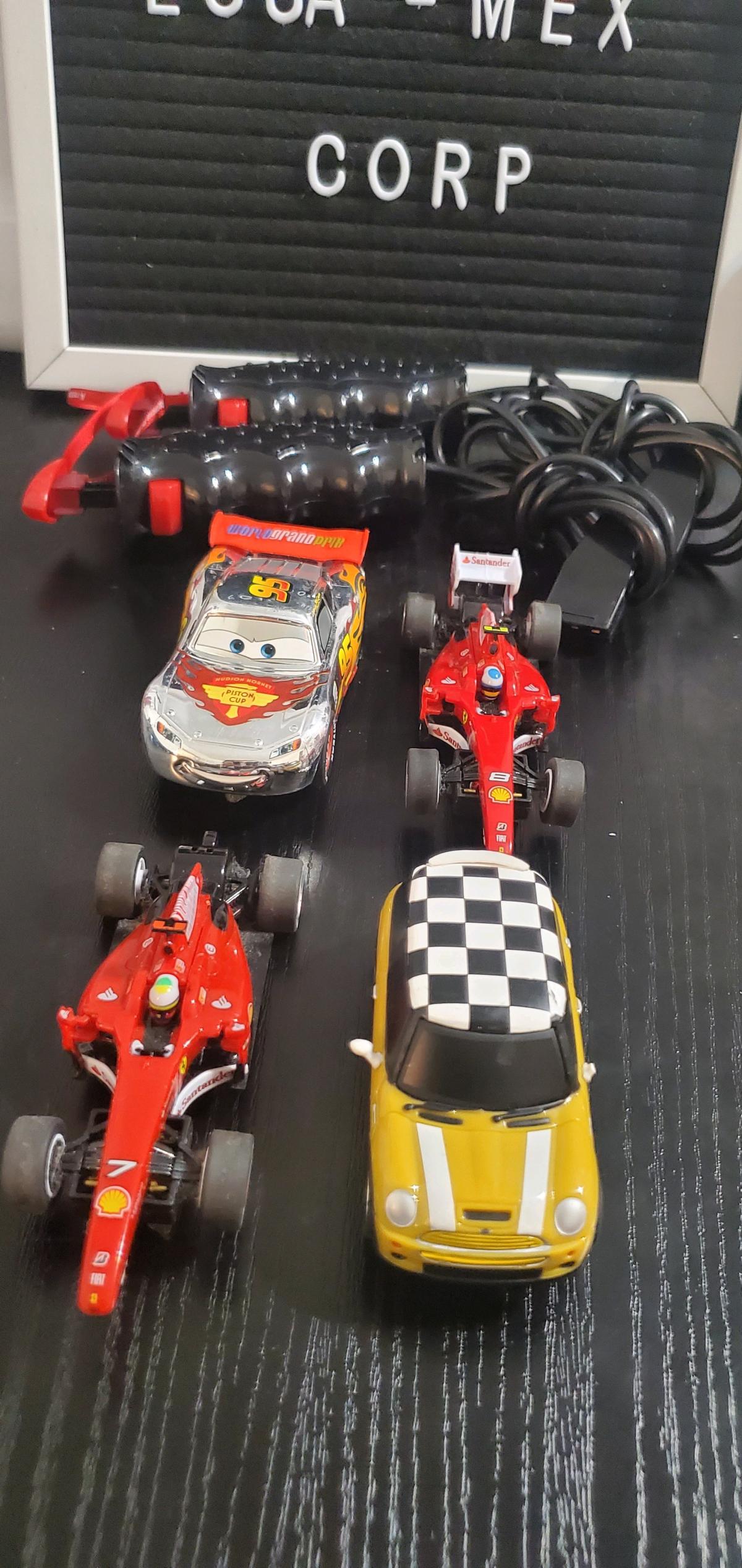 Lot of 4 Slot Racing Cars with 2 Wired Controllers