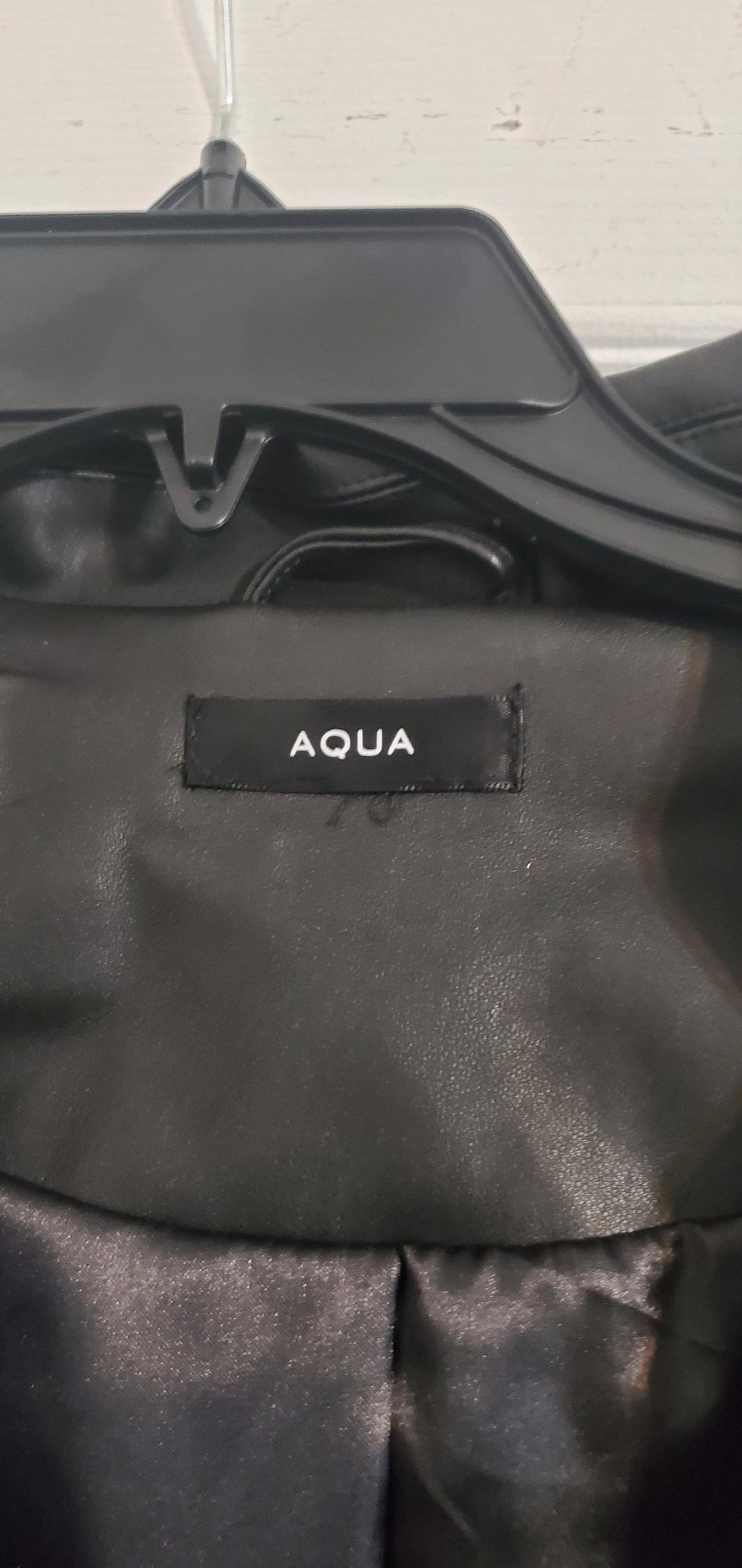 The image shows the Athleta Downtown Vest in a metallic silv