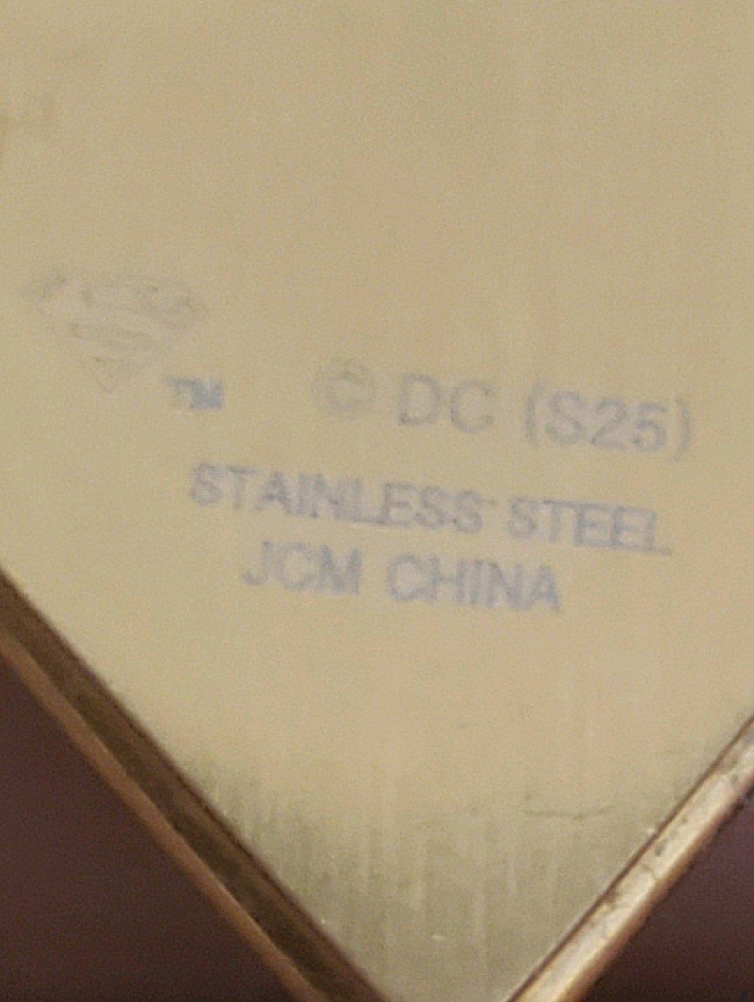 goldtoned Superman S shield pendan
