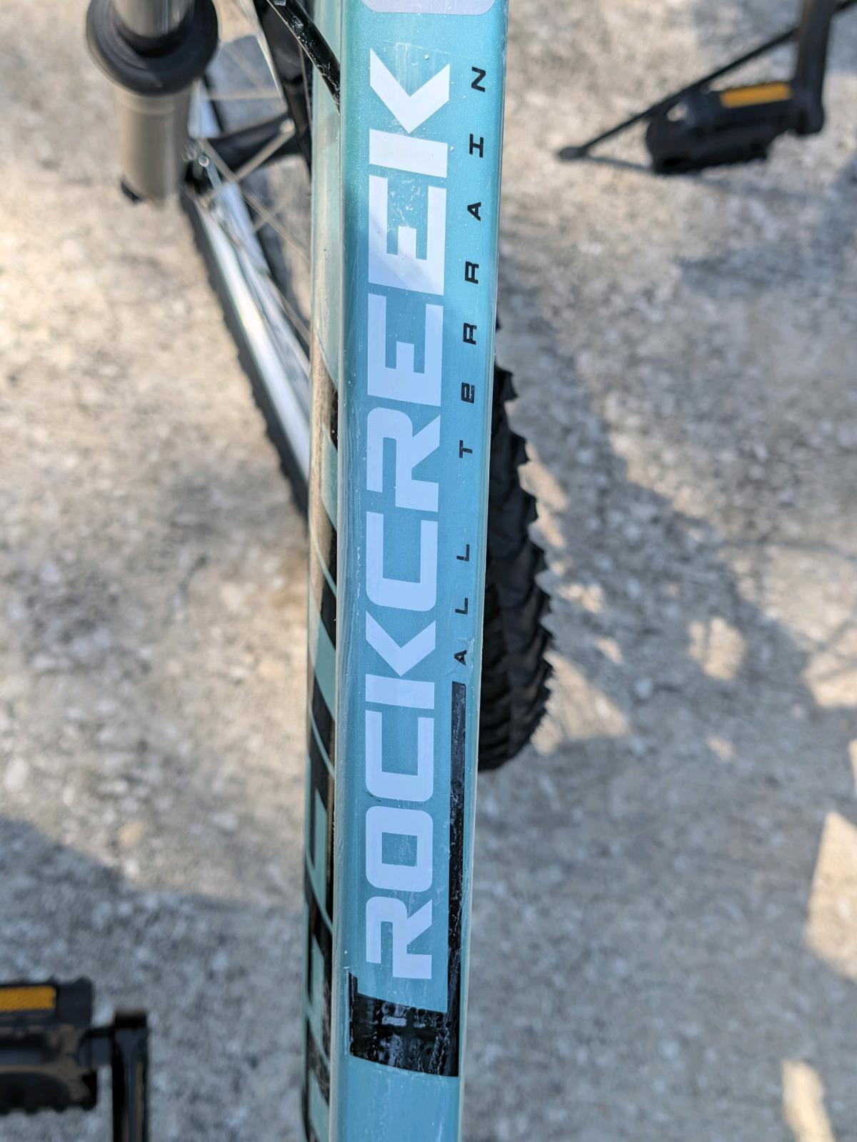 teal Huffy Rock Creek mountain bike