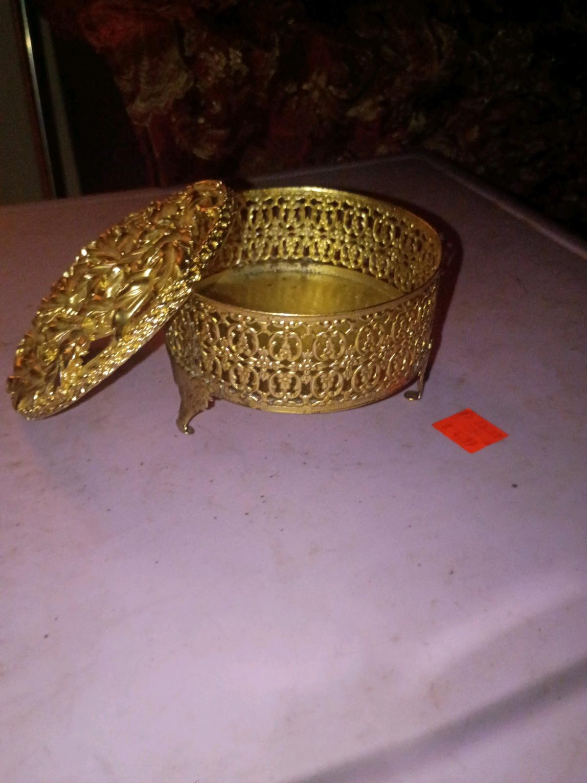 I have a beautiful Ormolu Gold Jewelry Box