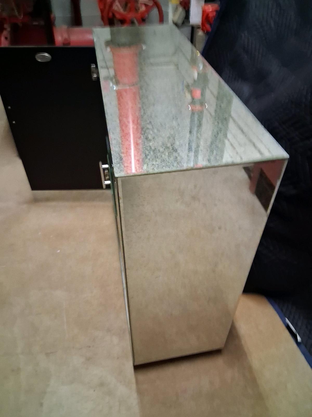 uttermost mirrored cabinet