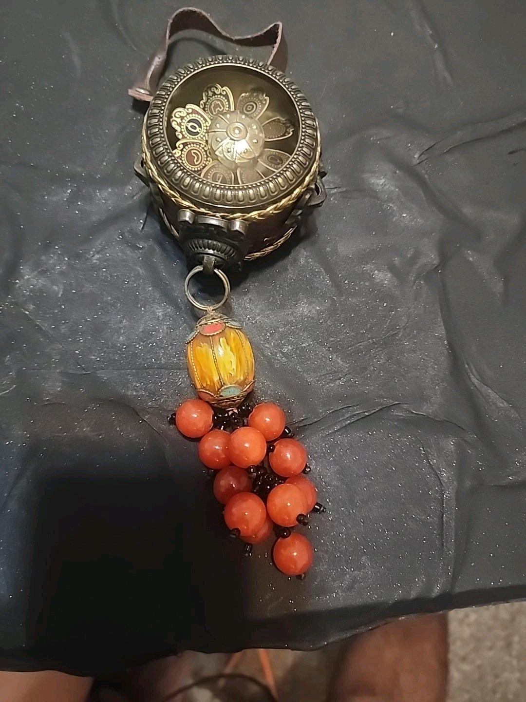 An ornate ethnic orHimalayanstyle barrel pendantfocal bead r
