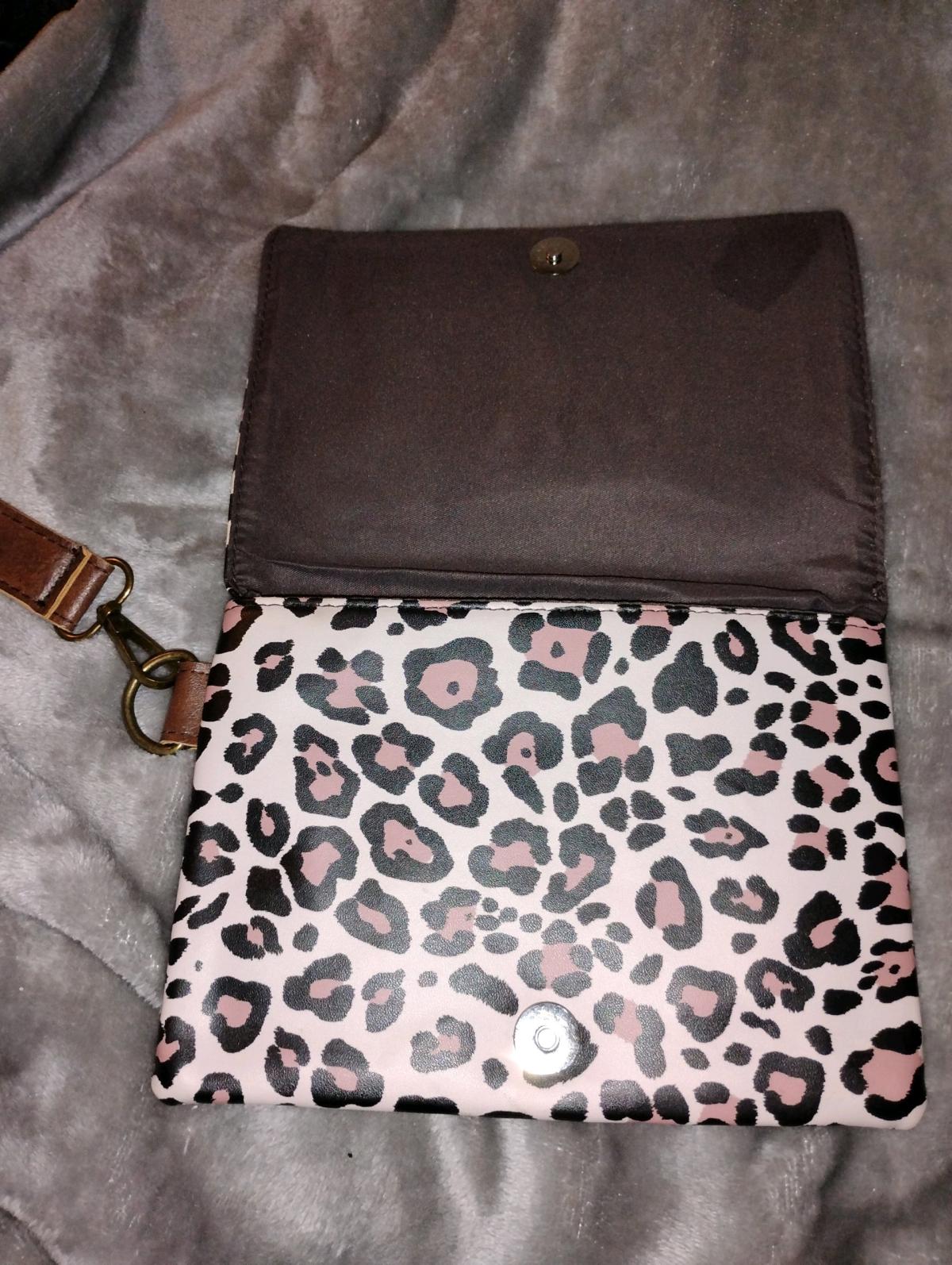 Louis Vuitton leopard print wristlet clutch