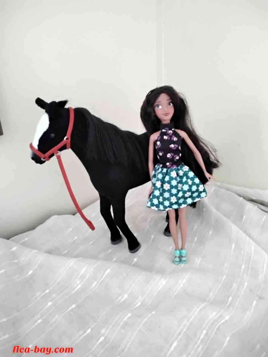 Barbie doll and horse toy