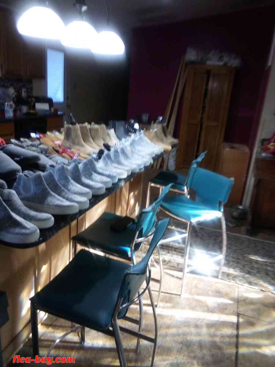 brand new shoes and slippers with price tags