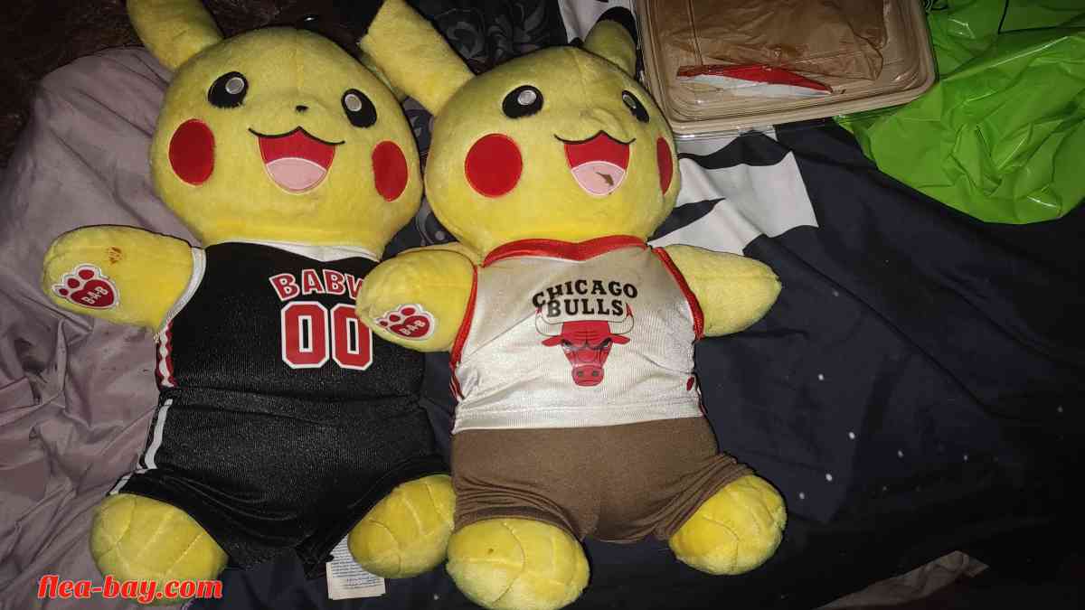 two large Pikachu stuffed dolls with talking voice box in th