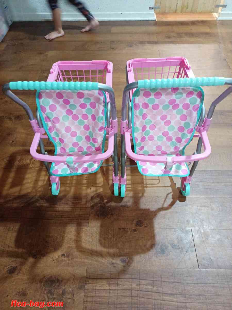 two little girl portable shopping baskets