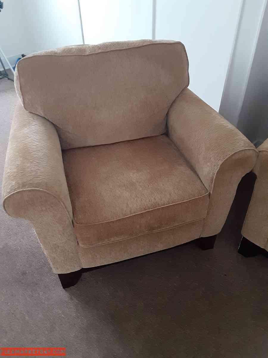 Tan colored sofa & chair set w/ throw pillows