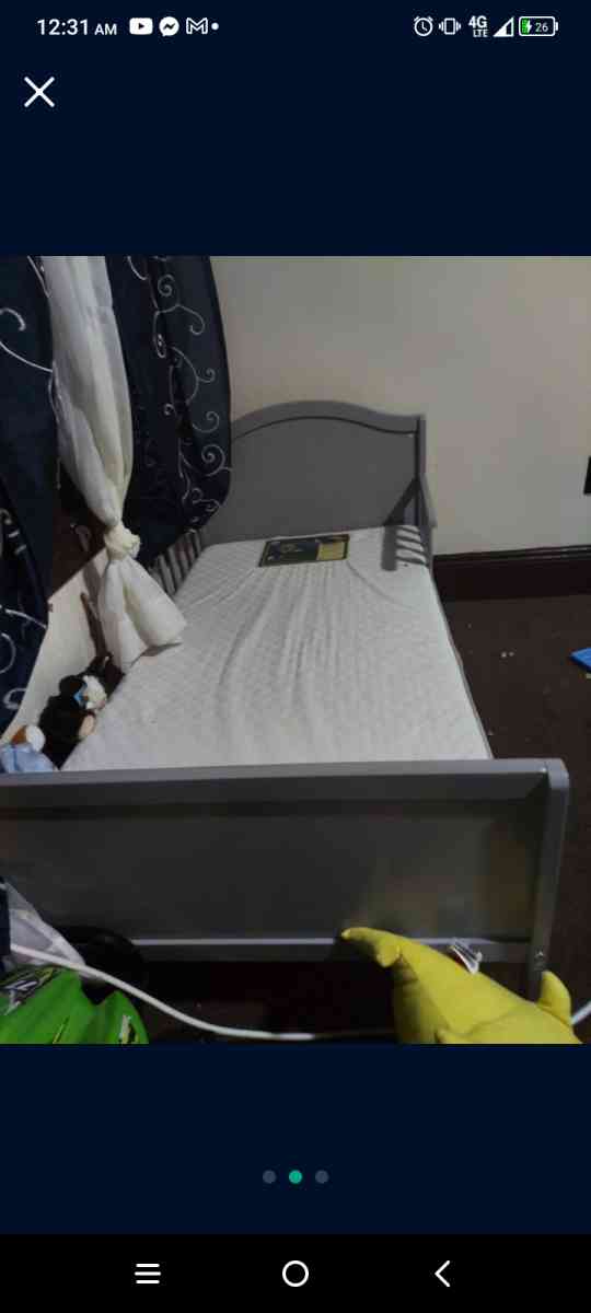 toddler bed frame with mattress.