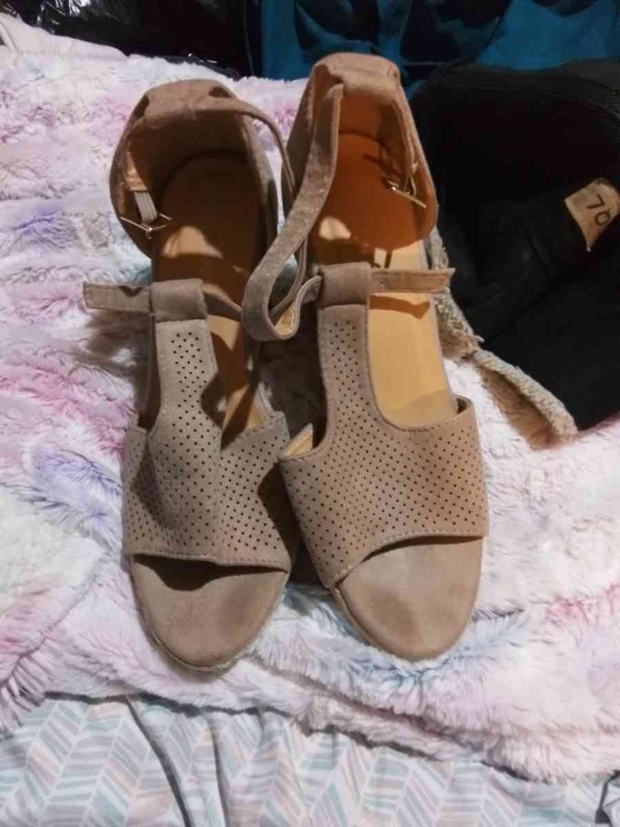 woman tan wedgevsandals