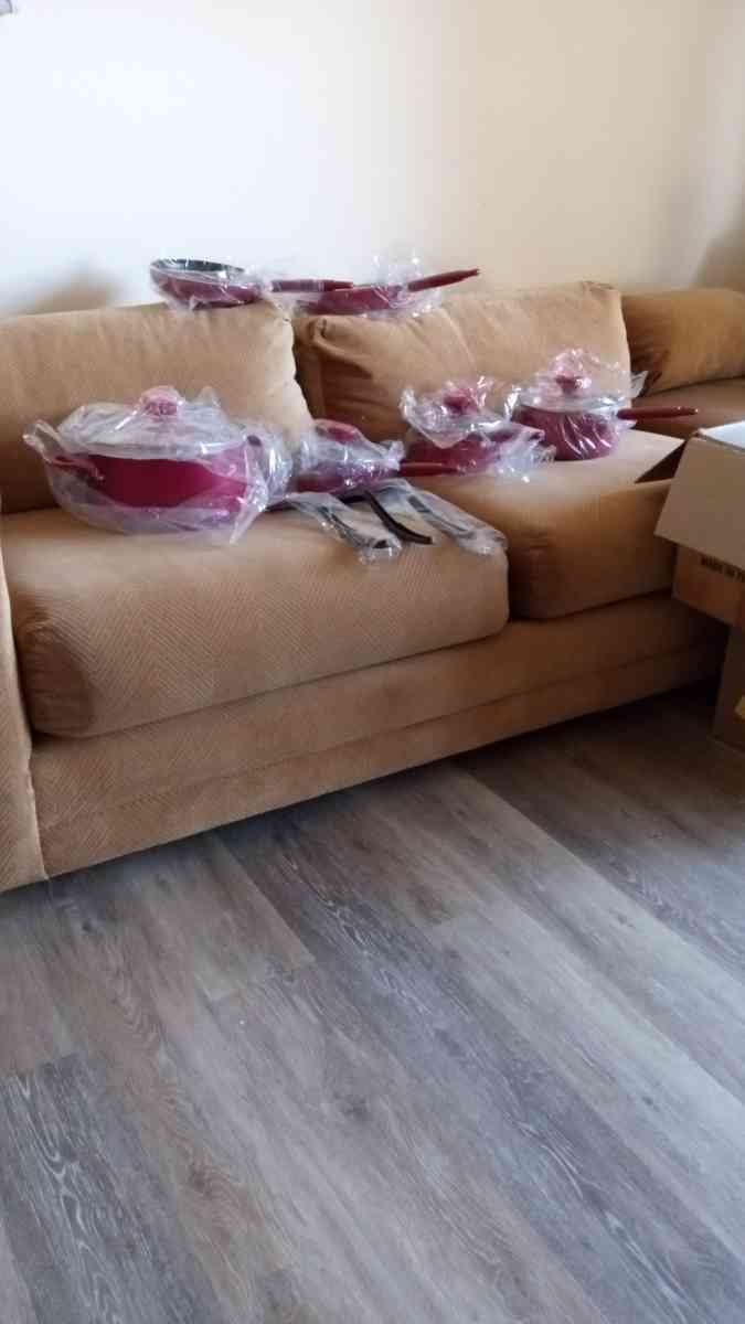 sofa and ottoman also buffet cabinet good condition as well