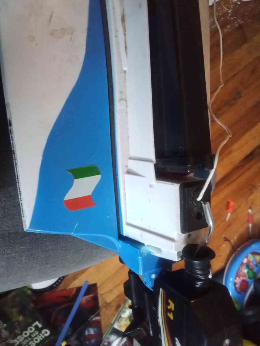 this is an old radio controlled speed boat with the battery