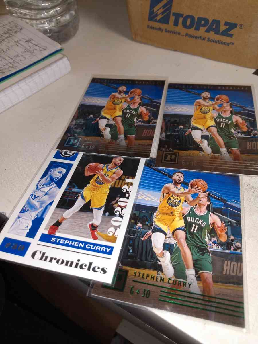 four card lot of Stephen Curry